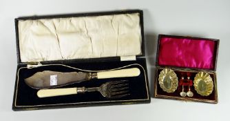 Cased silver plated fish knife and fish server and fork together with cased EPNS pair of salts and