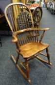 Elm seated spindle back rocking chair Condition reports provided on request by email for this