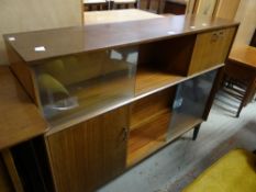 A mid-century sliding door bookcase, 122cms wide Condition reports provided on request by email