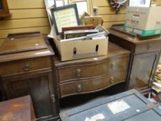 An Edwardian mahogany serpentine front break-top sideboard having two centre drawers, two flanking