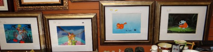 Four framed cartoon cells, three signed by BILL HANNA and JO BARBERA, the other of Garfield,