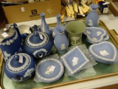 A parcel of Wedgwood blue Jasperware and a green similar flared vase Condition reports provided on