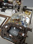 A pair of metallic cherubic easel portrait frames, pair of painted glass decanters and sundry