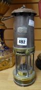 A late nineteenth / early twentieth century miner's lamp numbered 23 Condition reports provided on