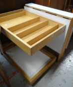 A retro Terrence Conran over-bed lightwood trolley with lift-out tray and compartments together with
