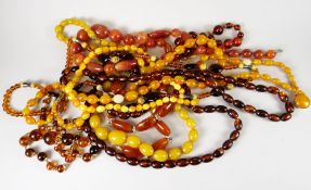 Nine strands of amber or style bead necklaces Condition reports provided on request by email for