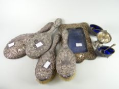A parcel of part-silver items to include dressing table set (damage), easel portrait frame and other