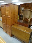 A double pine wardrobe and a gate-leg table Condition reports provided on request by email for