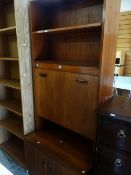A G-Plan teak lounge unit with integral cocktail cabinet Condition reports provided on request by