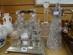 An EPNS cruet stand with six cut glass fitted bottles together with six various cut glass