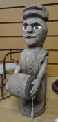 An interesting carved figure of a standing drummer, believed to be American folk-art possibly