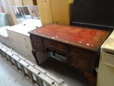 A large parcel of mixed furniture including reproduction desk, circular pine table and a set of