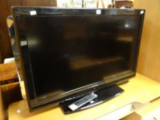 A Toshiba flatscreen TV Condition reports provided on request by email for this auction otherwise