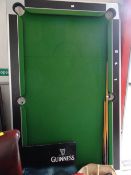A modern quarter size pool table with folding legs, accessories and a dart board Condition reports