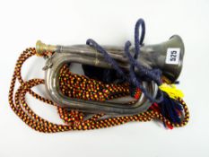 An electroplate military bugle bearing engraved coat of arms crest and inscribed 'Presented by the