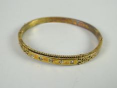 15ct gold five-stone diamond chip bangle, 9.8grams approx. Condition reports provided on request