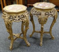Pair of Oriental gilt painted hardwood jardiniere or plant stands of octagonal form with marble