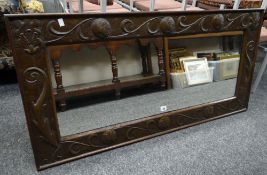 Manner of John Pearson Arts & Crafts copper and wood rectangular wall mirror decorated with bird,