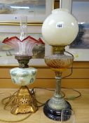 Two oil lamps - one with gilt metal fancy base and opaline floral reservoir and good tinted shade,