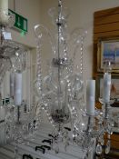 An impressive Venetian-style cut glass chandelier with lustre chains Condition reports provided on