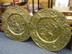 A pair of interesting, believed nineteenth century, repousse brass plaques commemorating Charles I