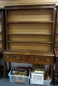 A small nineteenth century Welsh dresser, the base with three marquetry decorated drawers and a