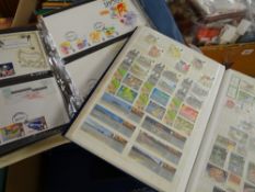 A large quantity of philatelic material in four outer containers including numerous albums and small