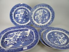 Four blue & white plates (some with chips) together with large blue & white dish, label for D J