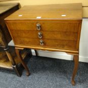 Twentieth century three-drawer floor-standing canteen of Community Plate cutlery on cabriole legs