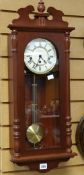 A modern dark wood Vienna-style wall clock Condition reports provided on request by email for this