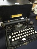 A cased vintage Underwood 'Standard' portable typewriter Condition reports provided on request by