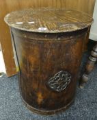 Cylindrical lift top grain / bin or laundry basket with scrumbled finish and flower head crest