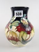 A modern Moorcroft baluster vase in the 'Anna Lily' pattern, dated to the base 1998, 16cms high