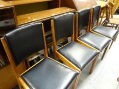 A set of four mid-century Gordon Russell kitchen chairs Condition reports provided on request by