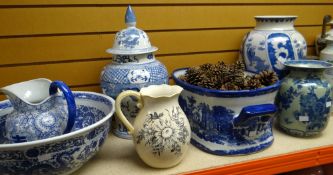 A collection of modern blue & white items including large bowl and jug, lidded jar, foot bath, vases