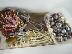 Two containers of costume jewellery, beads, pearls ETC Condition reports provided on request by