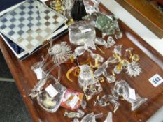 A quantity of Swarovski and other glass ornaments ETC Condition reports provided on request by email
