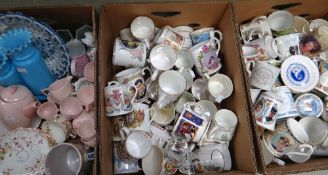 A large collection of royal commemorative mugs and loving cups together with a parcel of vintage