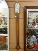 Antique stick barometer labelled 'Spencer & Son, Dublin'