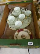 European porcelain cabaret tray with five matching cups and saucers and a set of six Chelsea bird