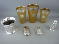 Three silver mounted horn beakers, a twist form vase, a cylindrical dusting pot and two vesta cases,