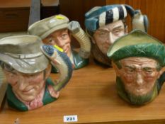 Four Royal Doulton character jugs - 'The Poacher', 'The Busker', 'Auld Mac' and 'The Falconer'