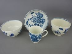 First period Worcester blue and white cup and saucer and two bowls, 'Three Flowers' pattern circa