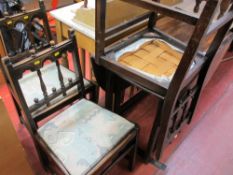 Oak drop leaf gate leg table and four Ercol labelled dining chairs