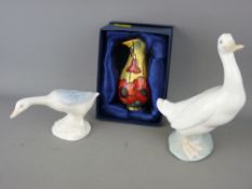Boxed Old Tupton ware jug, a Nao figure of a duck and one other
