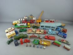 Good collection of vintage diecast vehicles and figures etc, mainly Dinky, most play worn but in