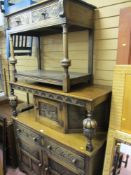 Carved buffet cupboard and a two tier, two drawer console table