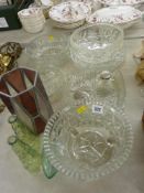 Selection of glass bowls and sectional serving dishes, a coloured glass shade and three green