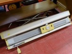 Imperial Knitmaster SRP-50 knitting machine, work table, small wooden folding ladder and a case with