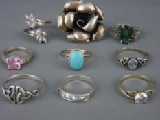 Nine silver lady's dress rings
